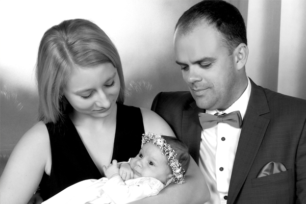 Przykład realizacji usługi wywoływania zdjęć, pokazujący wydrukowane fotografie w różnych formatach.